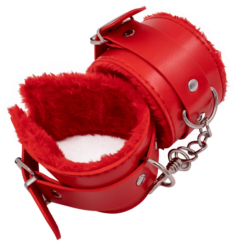 Red leather handcuffs with fuzzy interior